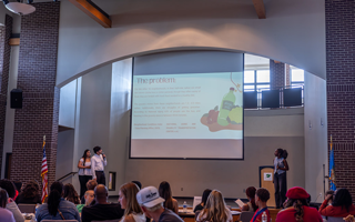 Photograph of Tulsa Youth Council members presenting their youth impact statements to the City Council.